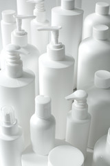 Group of White Plastic Containers