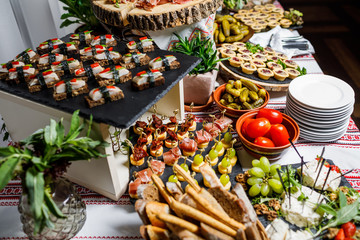 Beautifully decorated catering banquet table with different food