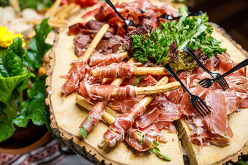 Salami, sliced ham, sausage, prosciutto, bacon. Meat antipasto p