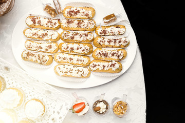 Candy Bar. Delicious sweet buffet with cupcakes. Sweet holiday b