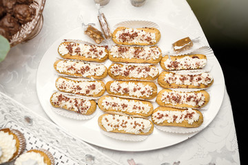 Candy Bar. Delicious sweet buffet with cupcakes. Sweet holiday b