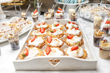 Candy Bar. Delicious sweet buffet with cupcakes. Sweet holiday b