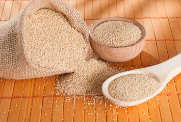 Raw Organic Amaranth grain on wooden table