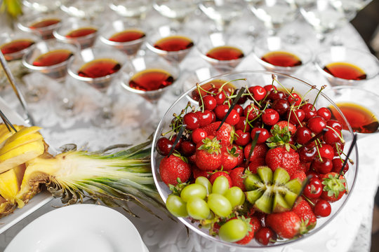 Wedding reception, decor table of fruits and caces