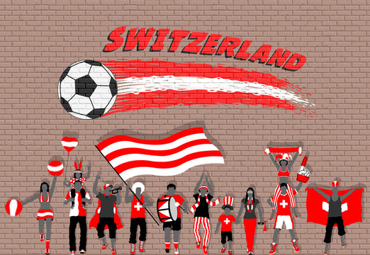 Swiss football fans cheering with Switzerland flag colors in front of soccer ball graffiti