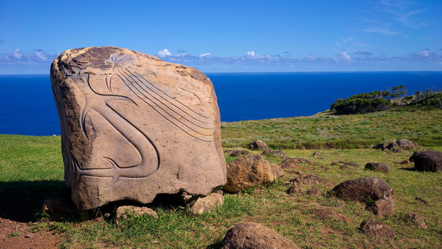 A Rapa Nui petroglyph located at the entrance of the ancient Orongo Village, on the Rano Kau volcano, Easter Island, Chile