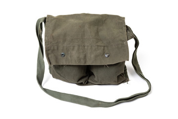 Vintage US Army carrying sack, worn on the back, made of green canvas, isolated on white