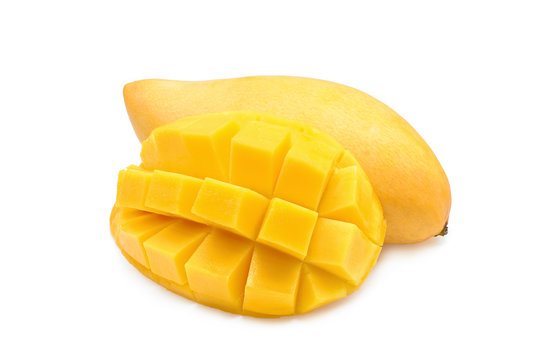ripe yellow mango fruit with slice isolated on white background