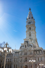 Exterior of the Philadelphia City Hall building, designed in French Second Empire style, completed in 1901. The clock tower is topped by a statue of William Penn, the city's founder.