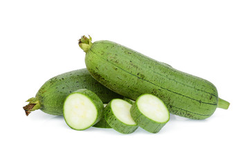 fresh green sponge gourd or luffa with slice isolated on white background