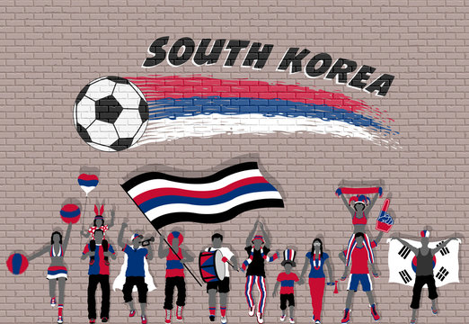 Korean football fans cheering with South Korea flag colors in front of soccer ball graffiti