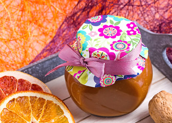 Obraz na płótnie Canvas Jar of honey. Jar of caramel. Composition of Sweets.
