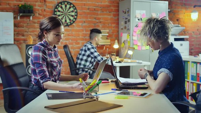 Quarrel between two journalists while working in office at publishing agency