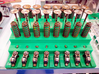 Valve, springs, rocker arms, car engine parts.