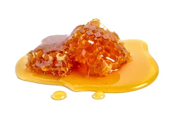 Abwaschbare Fototapete Honeycomb and honey isolated on white background © nipaporn