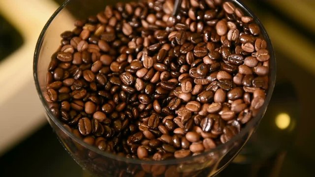 close shot of mixing roasted coffee