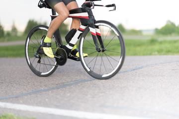 Fototapeta na wymiar Cyclist in maximum effort in an asphalt road outdoors