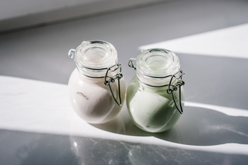 A set of natural cosmetics of body care: cream, gel, lotion isolated. Beauty treatment. Place for text and advertising. Side view. Sunlight. Cosmetology, spa. Skincare.