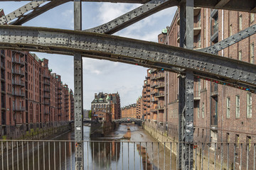 Naklejka premium View to the moated castle with arch bridge at Hamburg / Germany