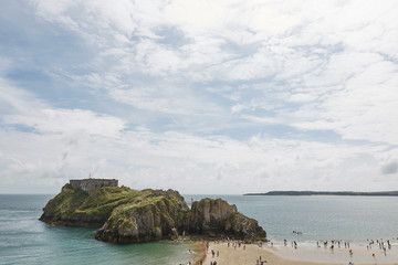 People at the beach in Tenby, Wales, UK.