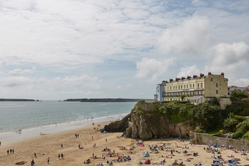People on beach in Tenby, Wales, UK