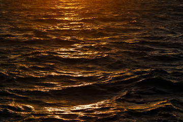 Sea waves at sunset
