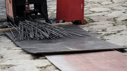 Steel cutter and some of steel on the stone floor