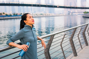 Tired runner after workout by the water