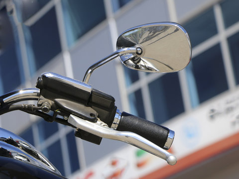 Motorcycle side mirror. handle and rear view mirror of motorcycle.
