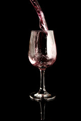 wine glass in black background