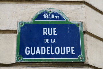 Rue de la Guadeloupe. Plaque de nom de rue. Paris