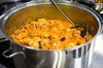 Warm and cold Food cooking in the big sauce pan in kitchen ready to be served