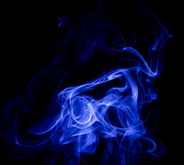 Blue smoke on black background