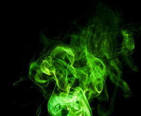 Green smoke on black background