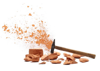 Shattered brick pieces and hammer isolated on white background, design element, with clipping path © dule964