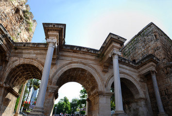 Fototapeta premium Hadrian's Gate panorama. Ancient construction in the old town in Antalya