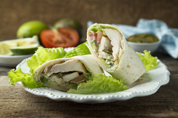Homemade chicken, tomato and avocado wrap