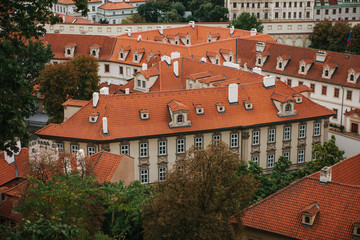 Beautiful traditional houses with orange tiled roofs in Prague in the Czech Republic