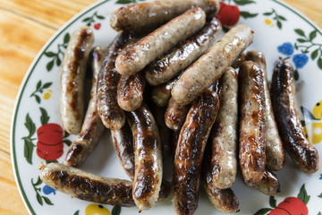 Grilled small sausages.