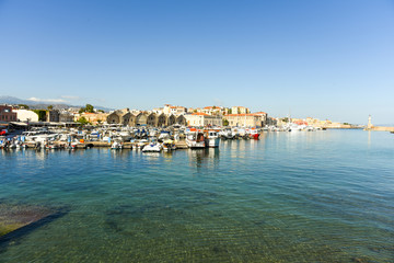 Obraz premium View of the Venetian port of Chania with the ancient venetian shipyards and center of mediterranean architecture