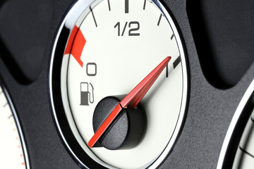 Naklejka premium fuel gauge in car dashboard - full