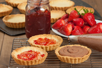 Homebaked Strawberry Tartlets With Ganache. Jam.