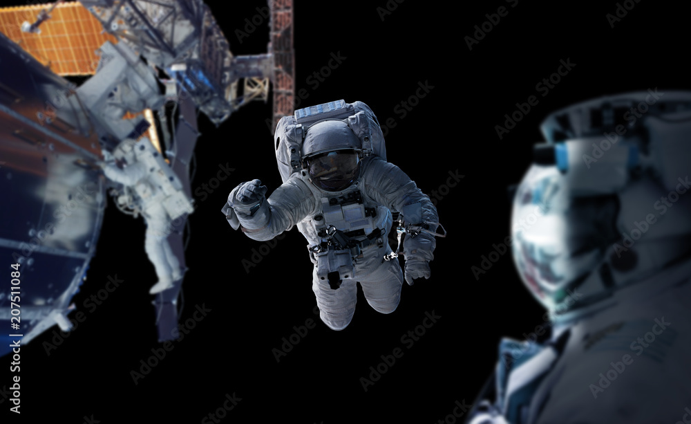 Poster astronaut working on a space station 3d rendering elements of this image furnished by nasa
