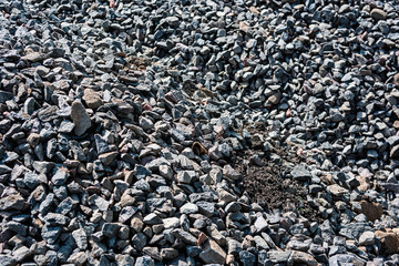 A large pile of road gravel