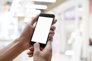Smart phone showing blank screen in man hand with blurred Background