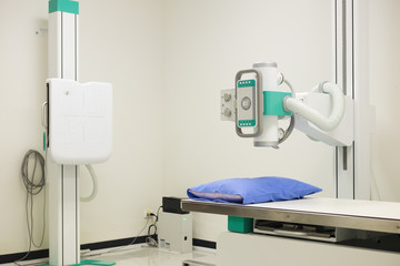 X-ray machine in the hospital, An irradiated radiation emitting device to the patient.Modern medical equipment, interventional medicine and healthcare concept.