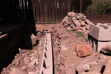 Work place. Building new house. Brick line as foundations