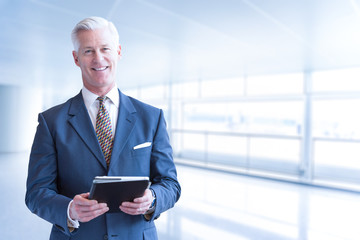 Senior businessman in his office