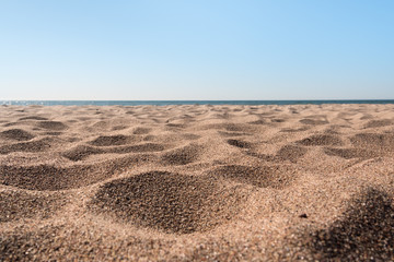 Fototapeta na wymiar Coarse sand on Baltic sea beach.