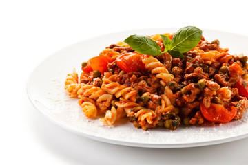Pasta with tomato sauce on white background